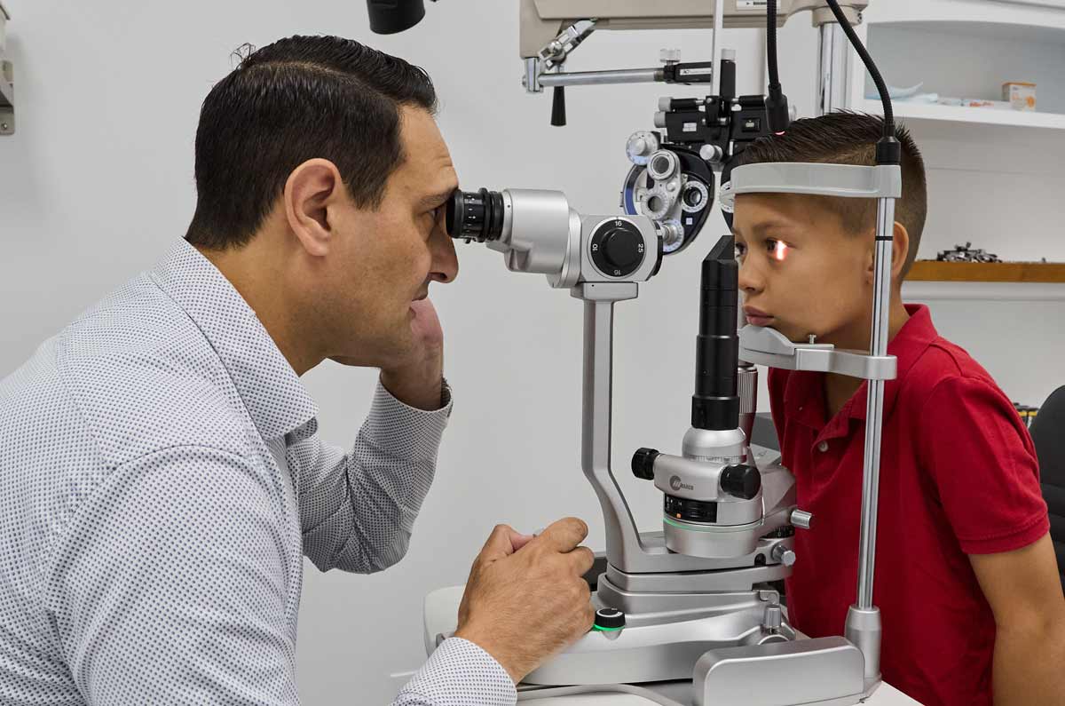 Slit Lamp Biomicroscopy Examination at The Eye Care Center Illinois | Dr. Quentin Park O.D. Optometrist performing slit lamp biomicroscopy examination, examining eye structures at 10 to 40 times magnification
